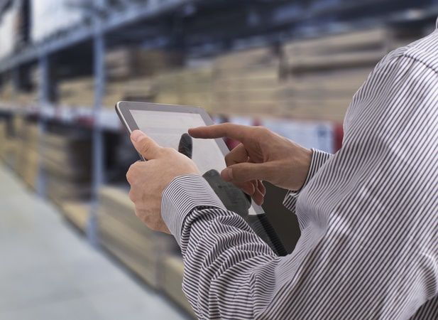 Stock photo of man working on a tablet